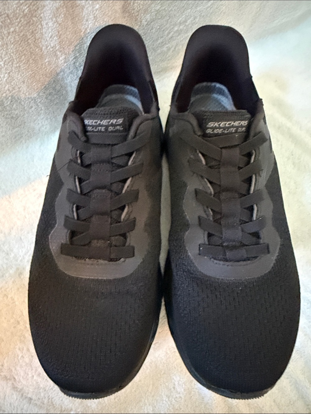 Skechers Men's Black Lightweight Slip-In Knit Sneakers